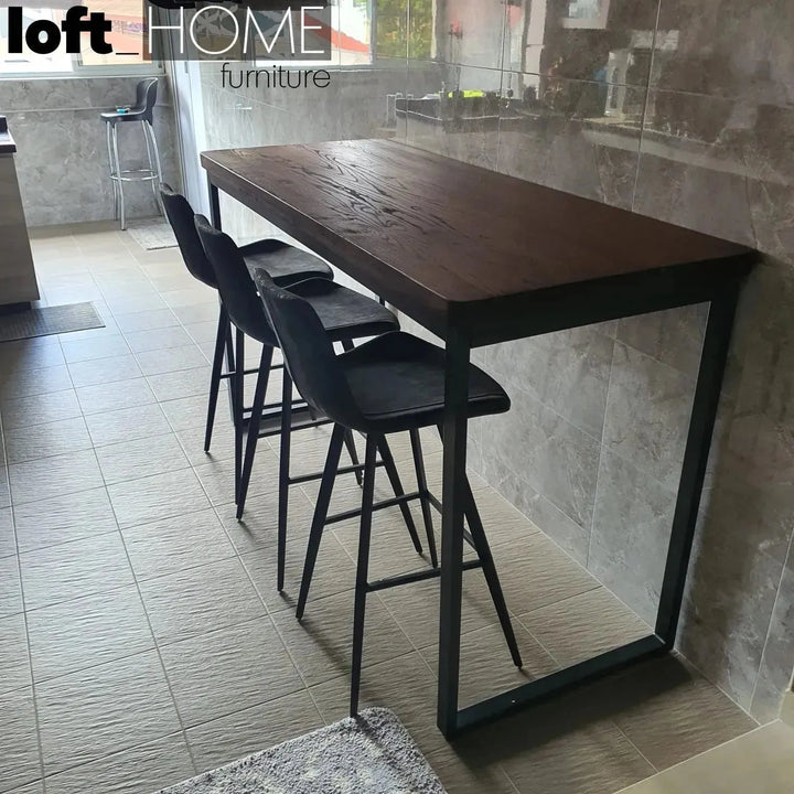 Industrial elm wood bar table hardy in close up details.