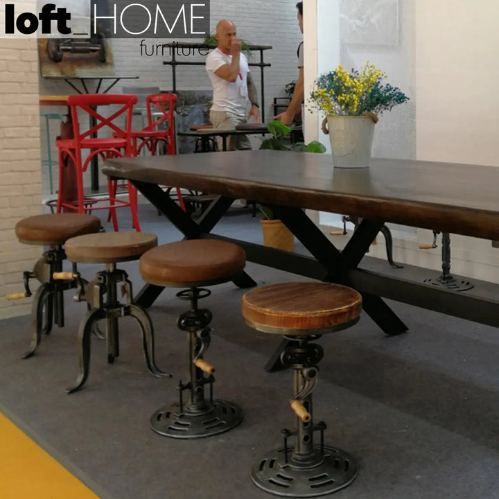 Industrial leather height adjustable stool gear in real life style.