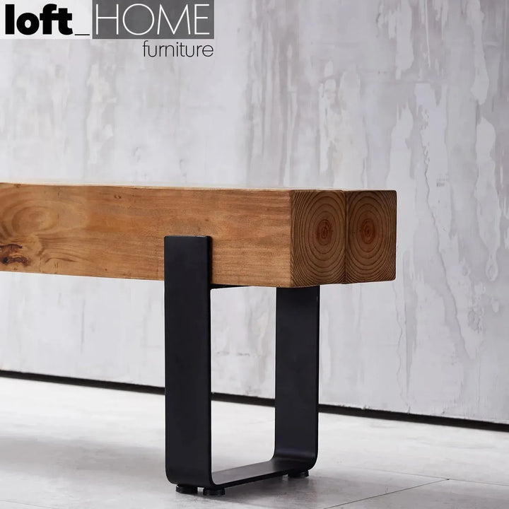 Rustic pine wood dining bench noer in panoramic view.