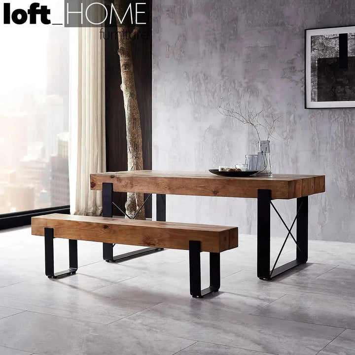 Rustic pine wood dining bench noer with context.