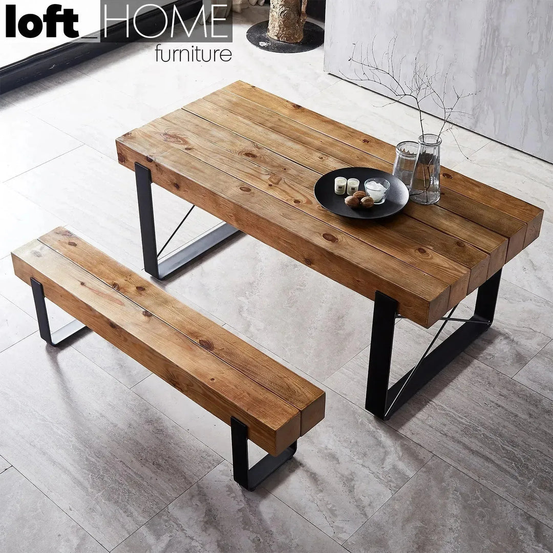 Rustic pine wood dining bench noer in close up details.