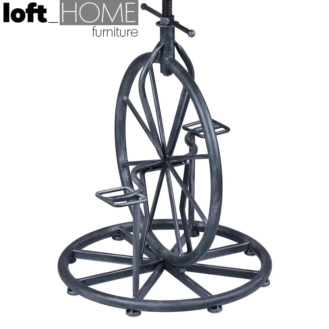 Industrial wood height adjustable bar stool bike in real life style.