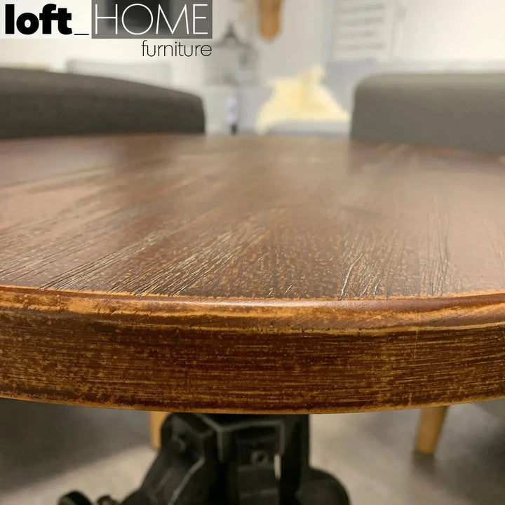 Industrial wood side table height adjustable in details.