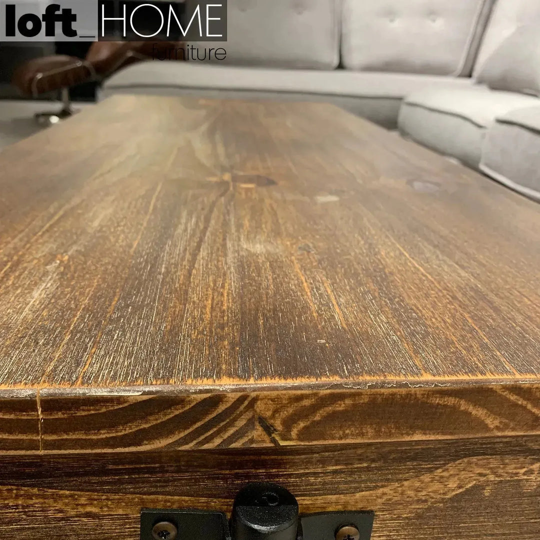 Industrial wood wheel coffee table industrial in close up details.