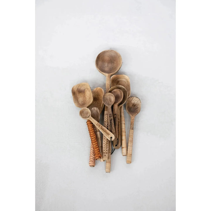 Mango wood spoon with bamboo wrapped handle decor material variants.