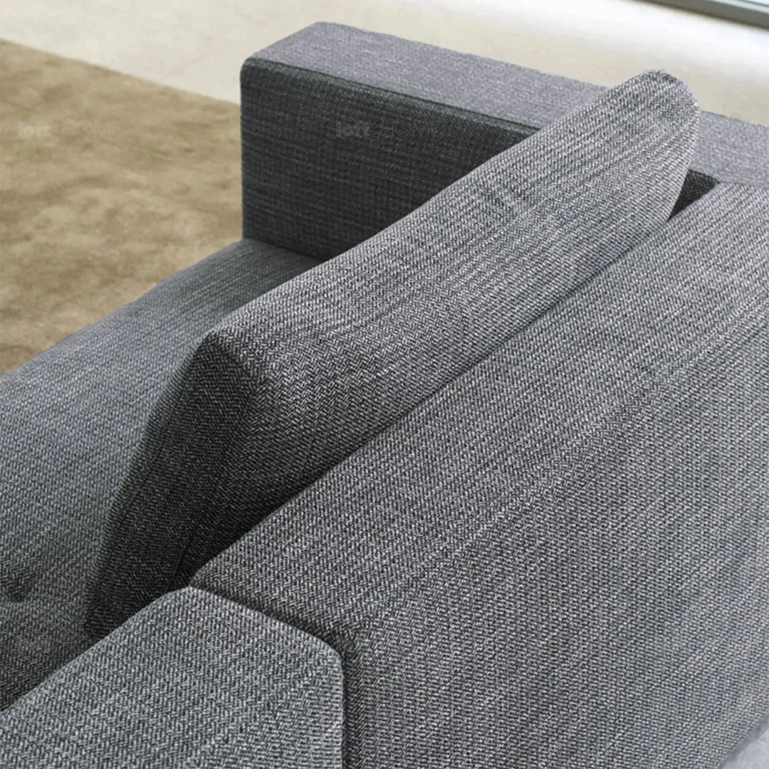 Minimalist fabric 3 seater sofa bri in still life.