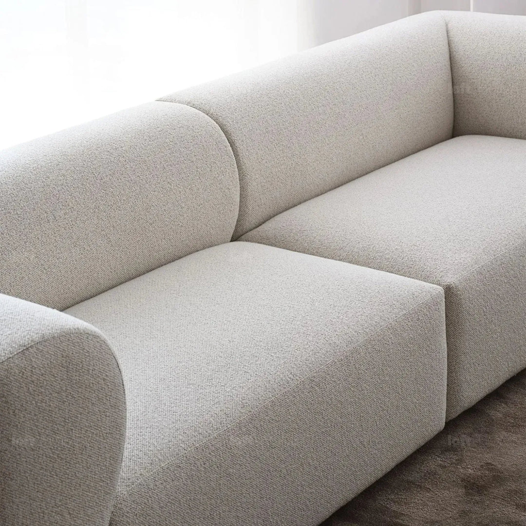 Minimalist fabric 3 seater sofa flower in details.