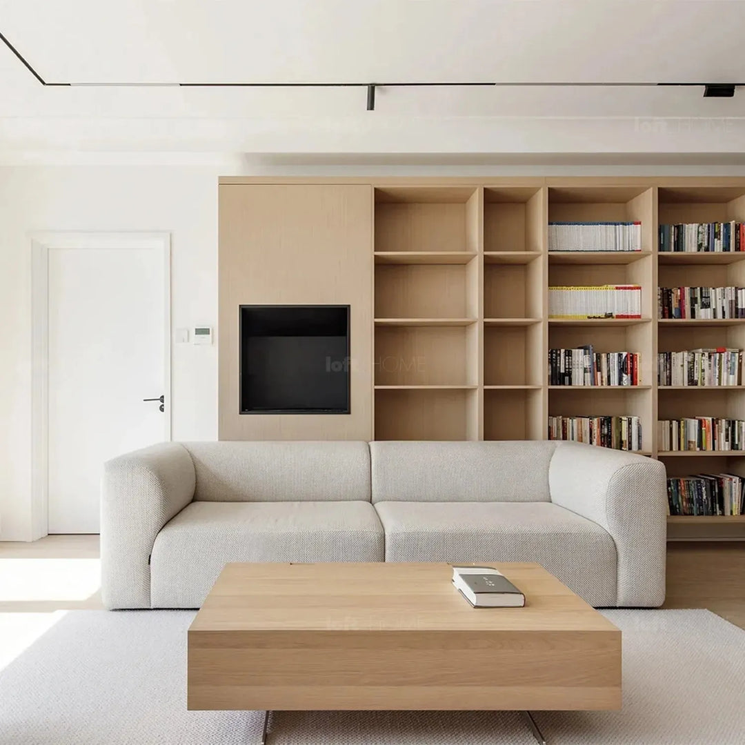 Minimalist fabric 3 seater sofa flower with context.