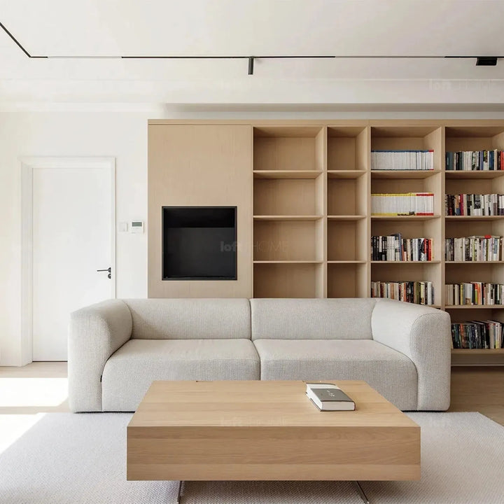 Minimalist fabric 3 seater sofa flower with context.