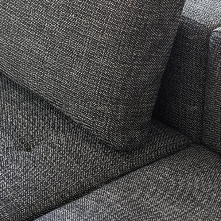 Minimalist fabric 3.5 seater sofa bri in panoramic view.