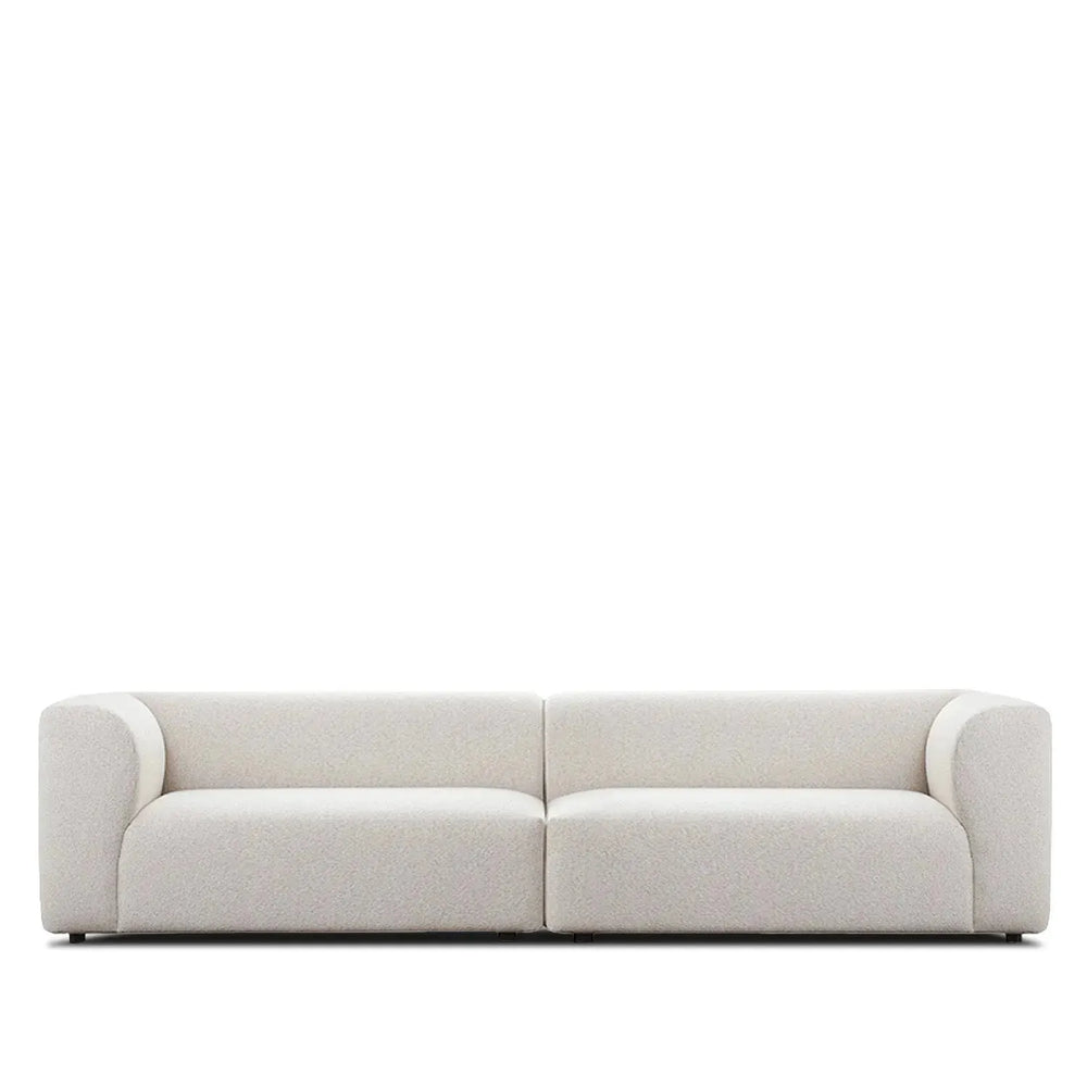 Minimalist fabric 4 seater sofa flower in white background.