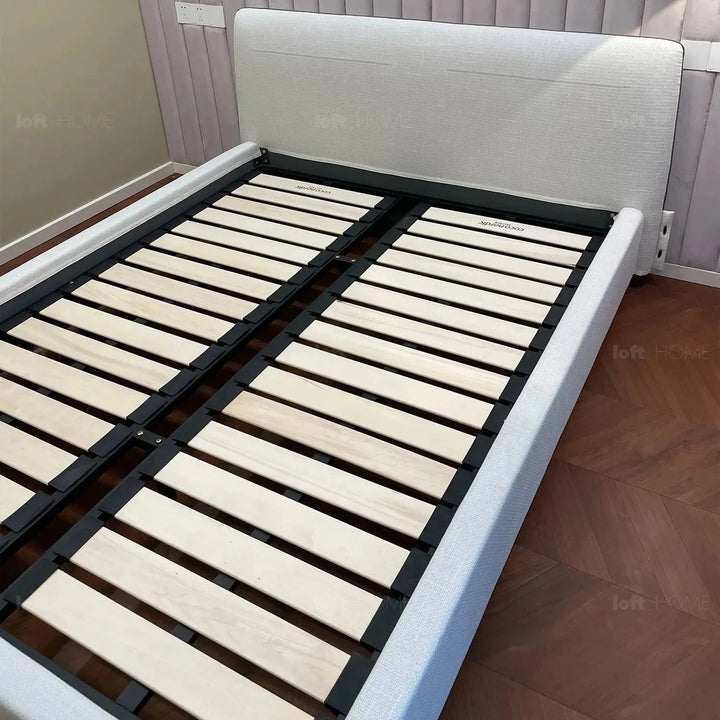 Minimalist fabric bed muuo in still life.