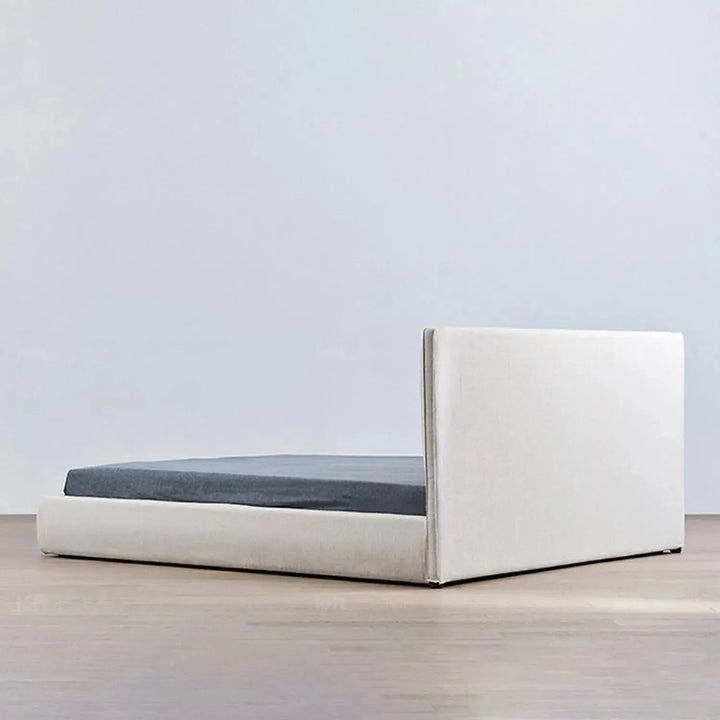 Minimalist fabric bed sino in panoramic view.