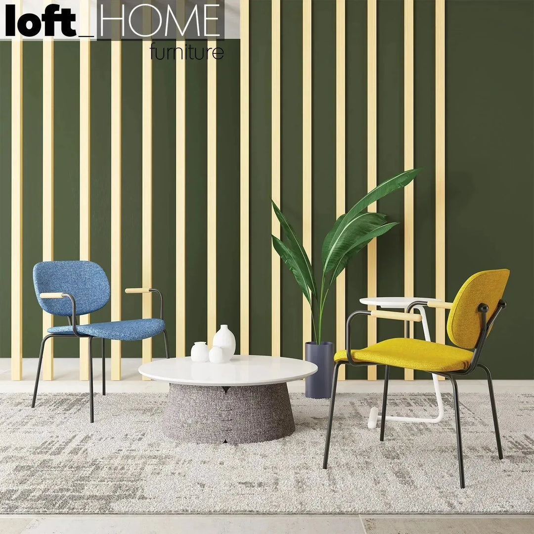 Industrial fabric dining chair et arm with context.