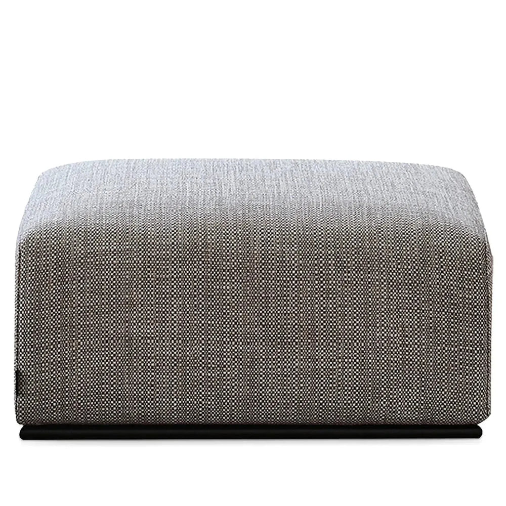 Minimalist fabric ottoman nemo in white background.