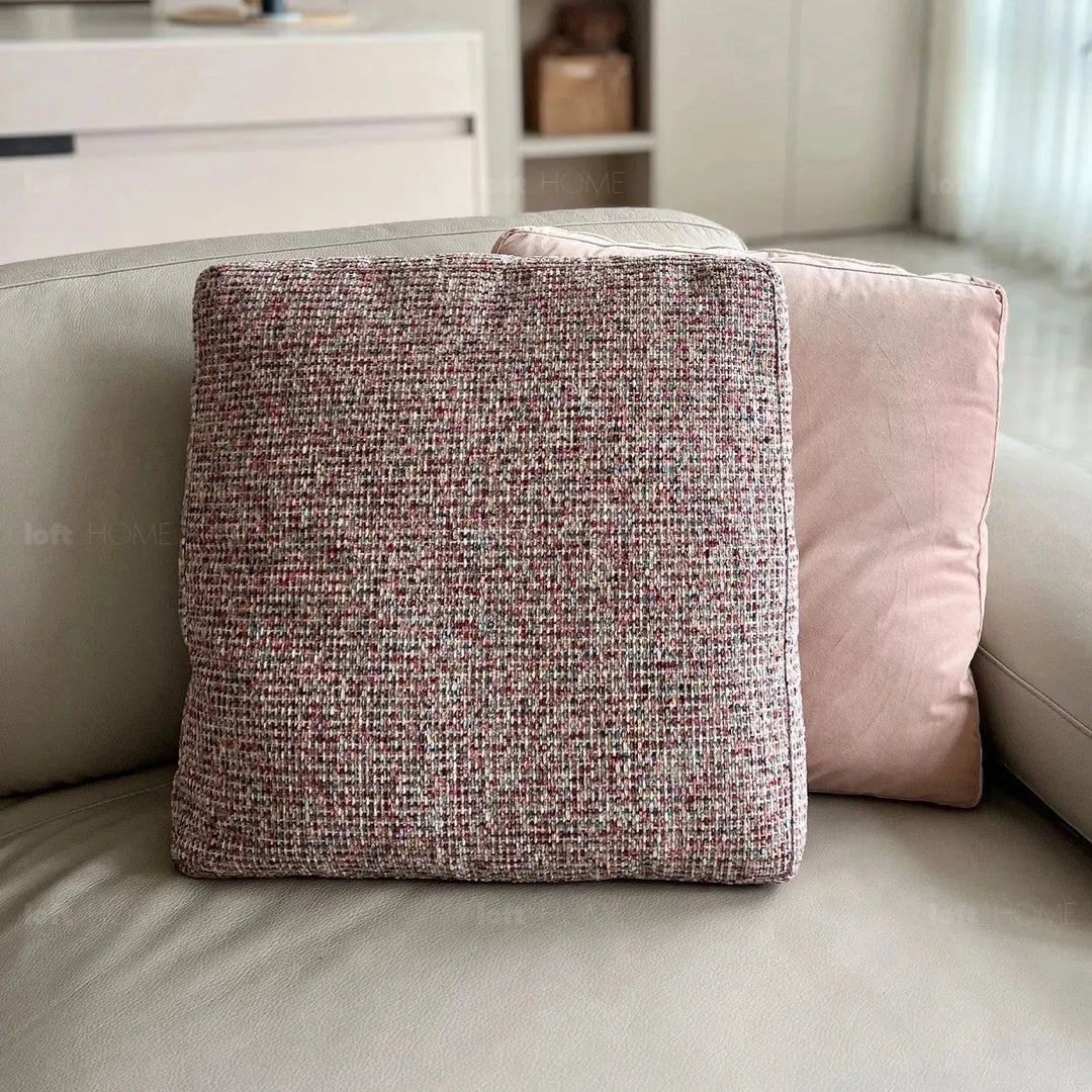 Modern fabric sofa pillow autumn pink in still life.