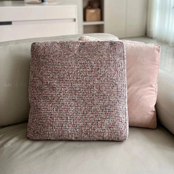 Modern fabric sofa pillow autumn pink in still life.