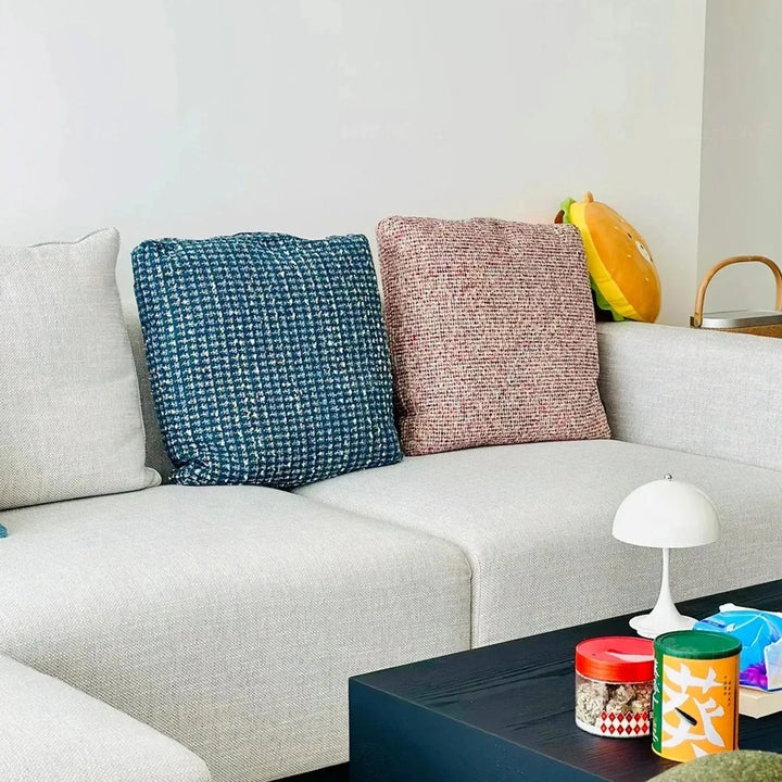 Modern fabric sofa pillow autumn pink material variants.
