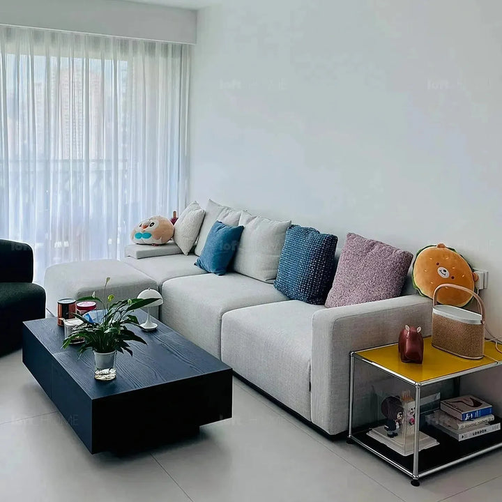 Modern fabric sofa pillow autumn pink with context.