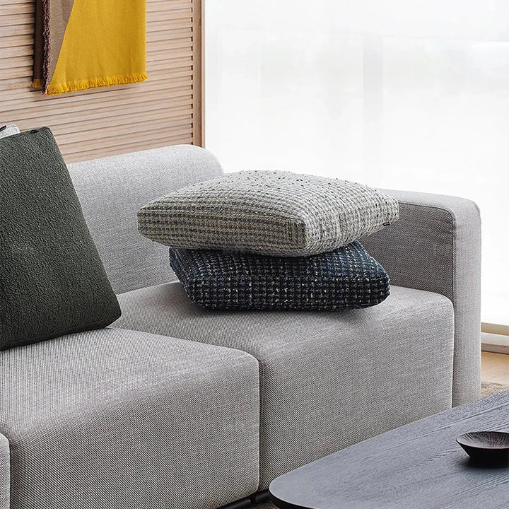 Scandinavian fabric sofa pillow sapphire blue material variants.
