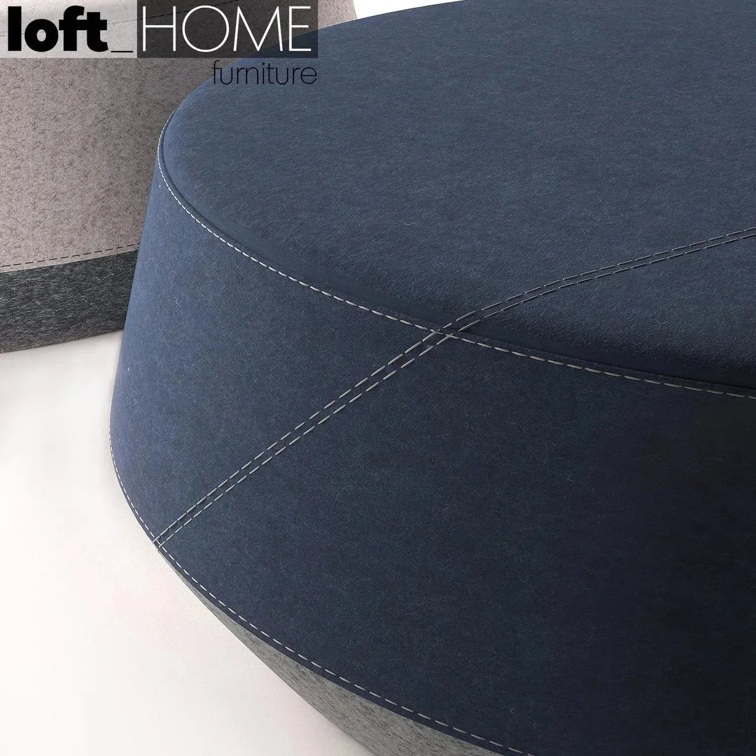 Modern fabric ottoman buono in real life style.