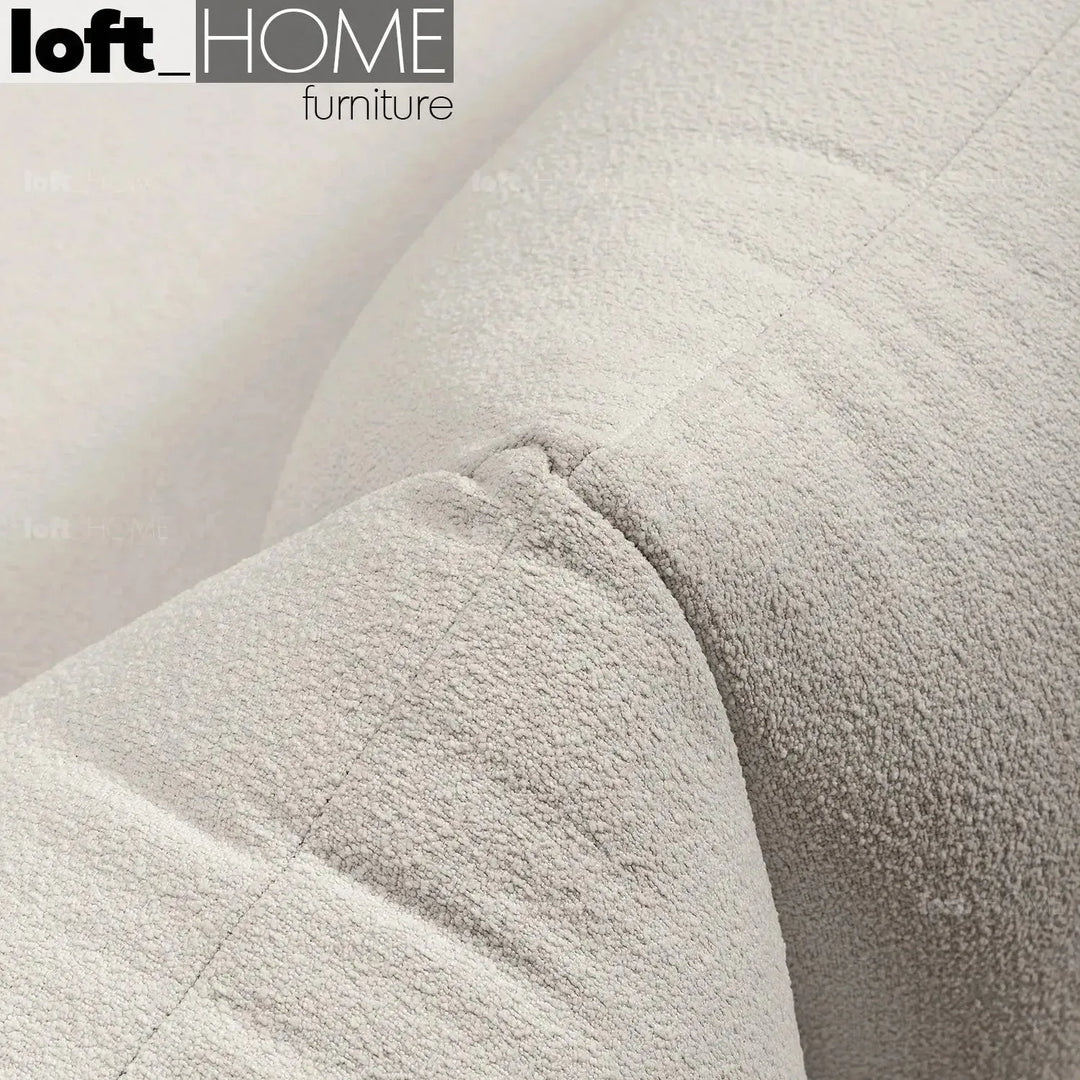 Cream teddy fabric 1 seater sofa marenco with context.