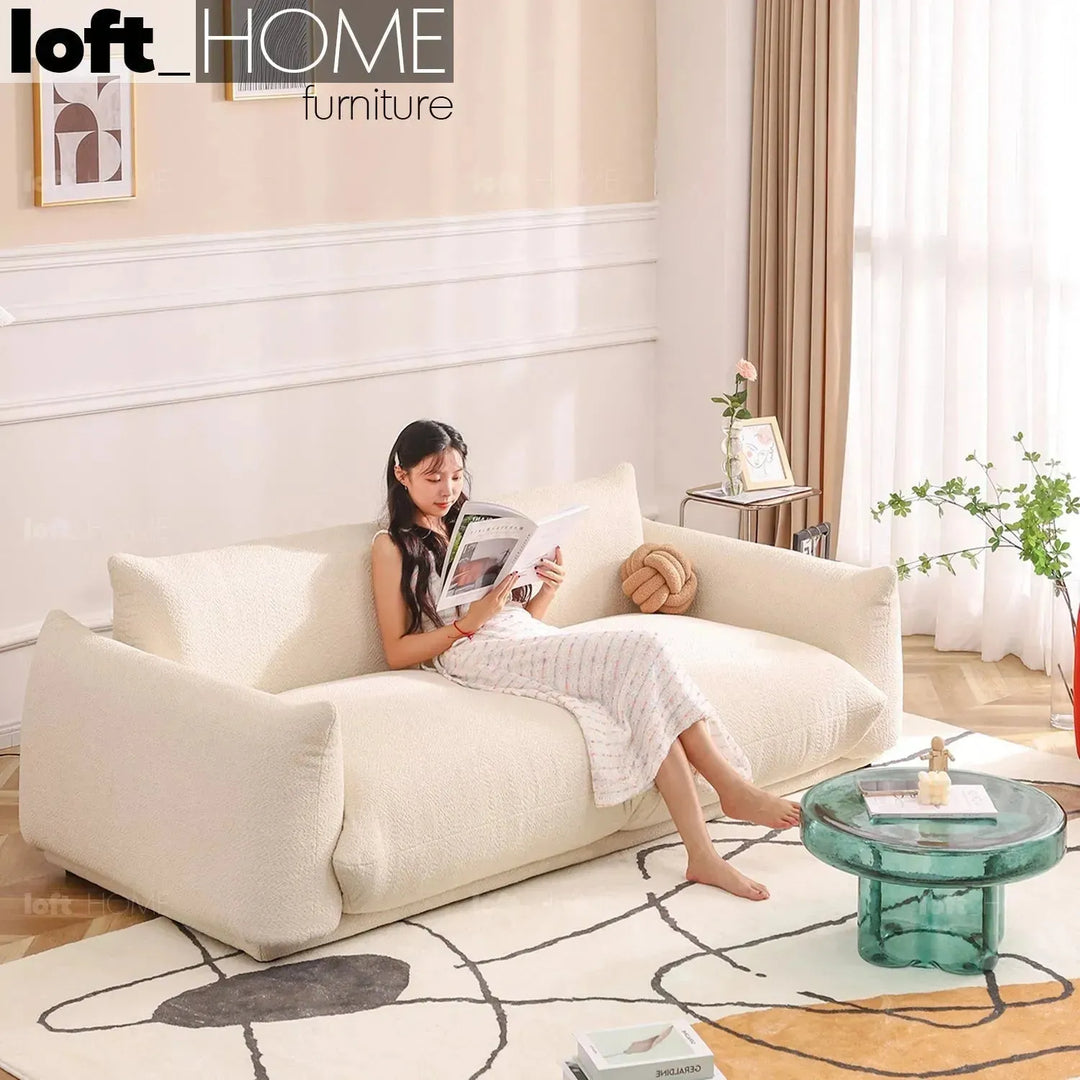 Cream teddy fabric 2 seater sofa marenco in panoramic view.