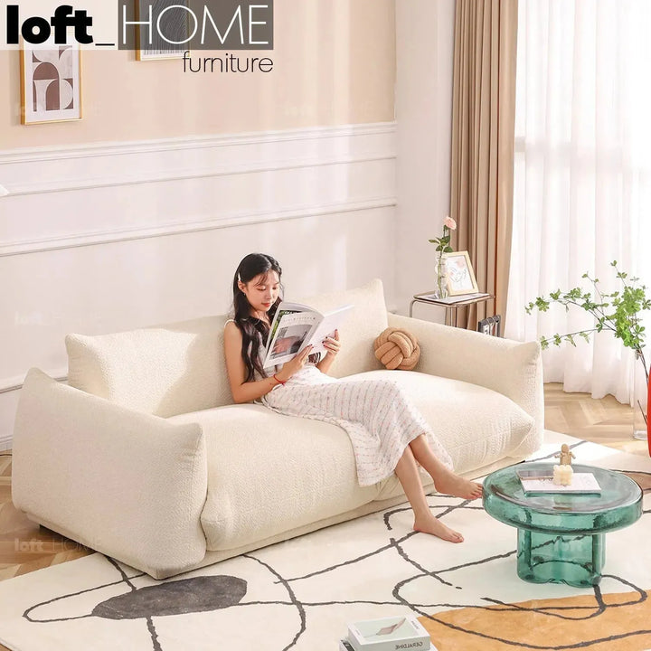 Cream teddy fabric 2 seater sofa marenco in panoramic view.