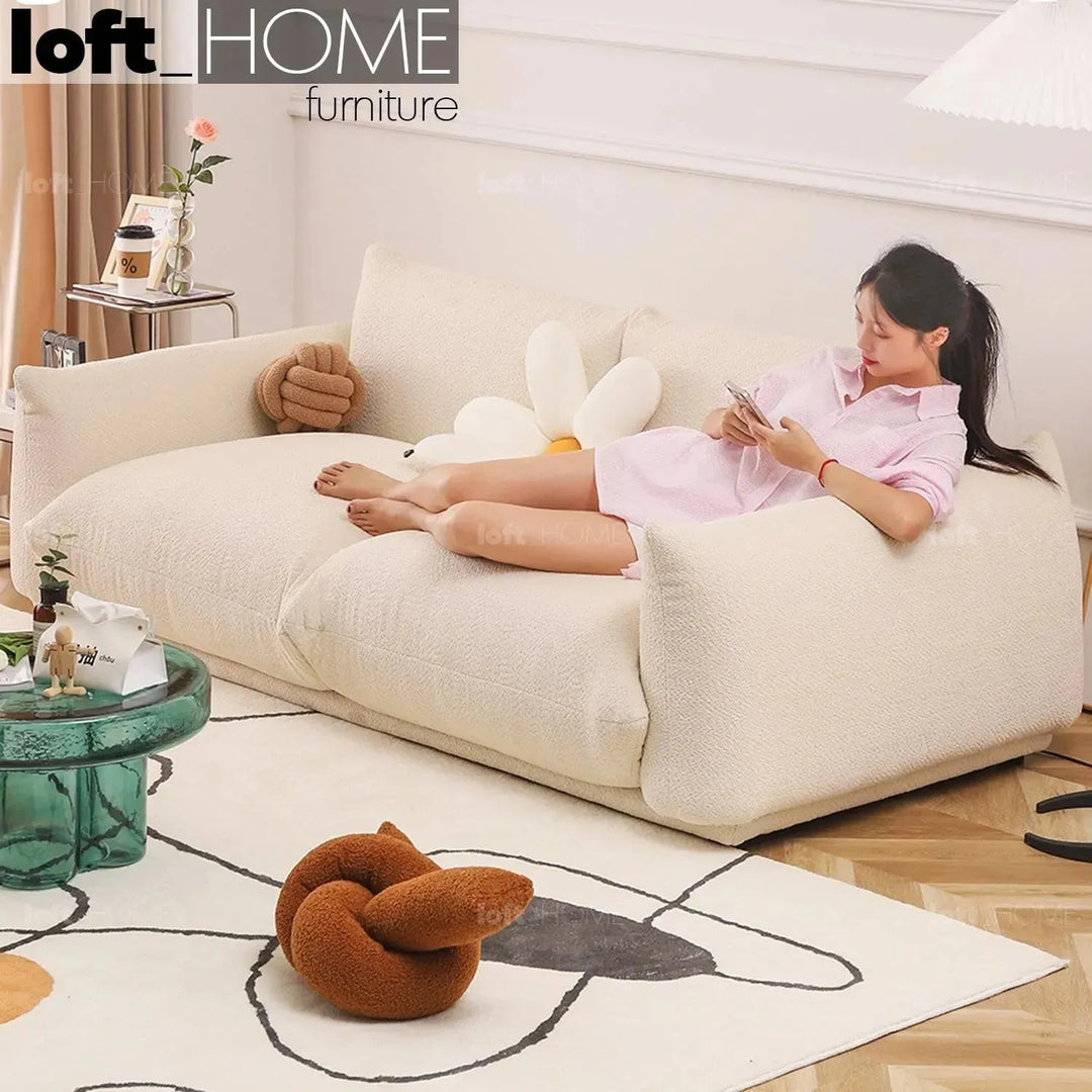 Cream teddy fabric 2 seater sofa marenco in still life.