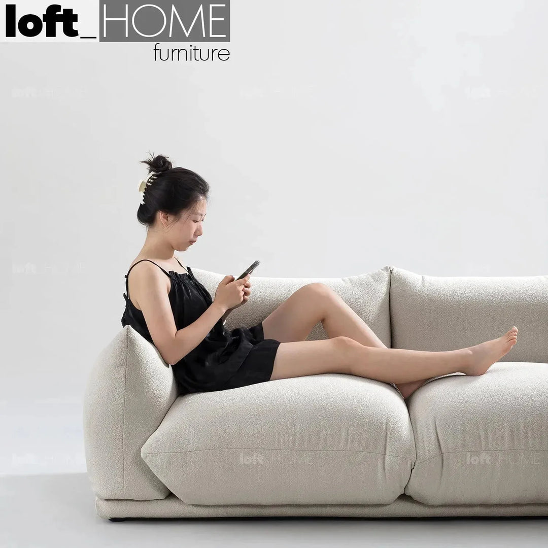 Cream teddy fabric 3 seater sofa marenco in panoramic view.