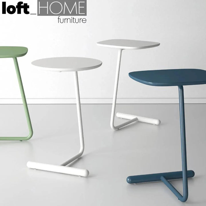 Minimalist wood side table origin with context.