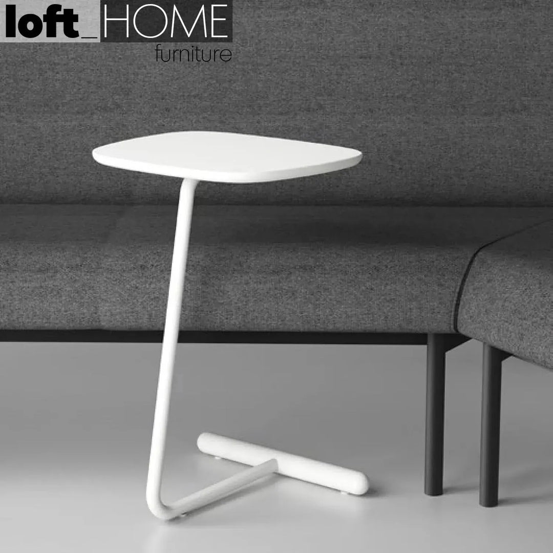 Minimalist wood side table origin in panoramic view.