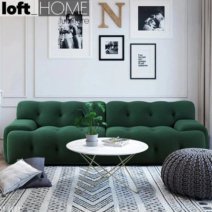 Contemporary fabric 3 seater sofa blogger in panoramic view.