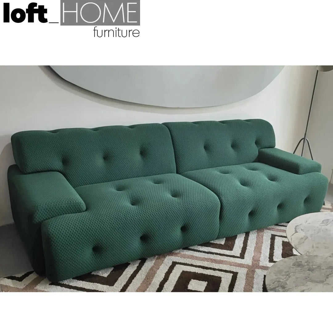 Contemporary fabric 3 seater sofa blogger with context.