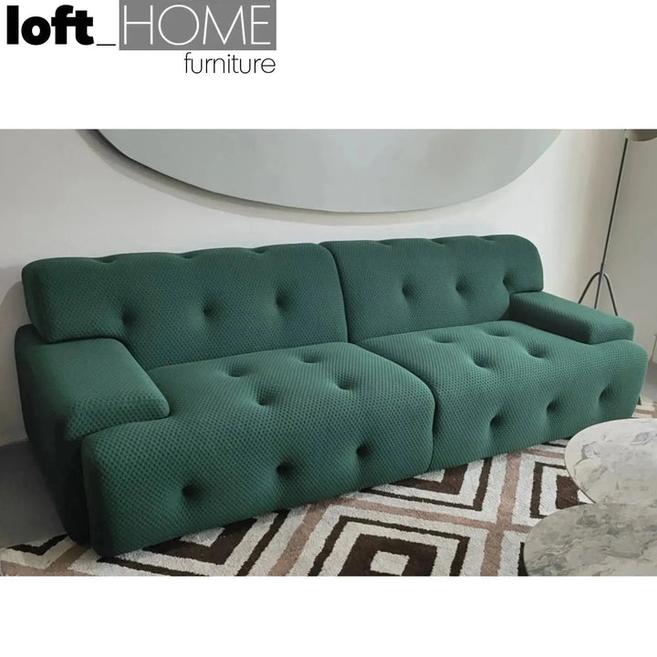 Contemporary fabric 3 seater sofa blogger with context.