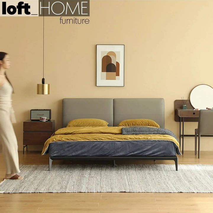 Minimalist genuine leather bed armelle in panoramic view.