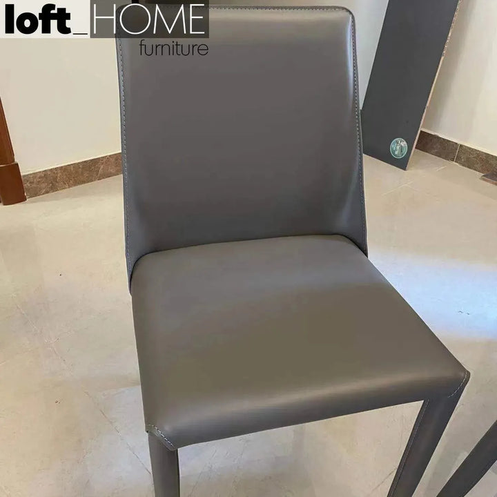 Modern pu leather dining chair silver in close up details.