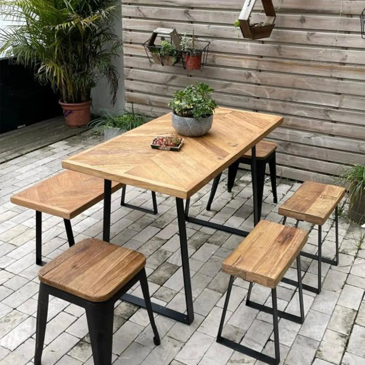 Rustic elm wood dining table fishbone elm with context.