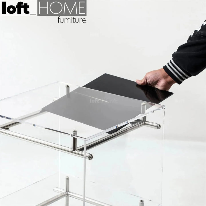 Contemporary acrylic side table josy with context.