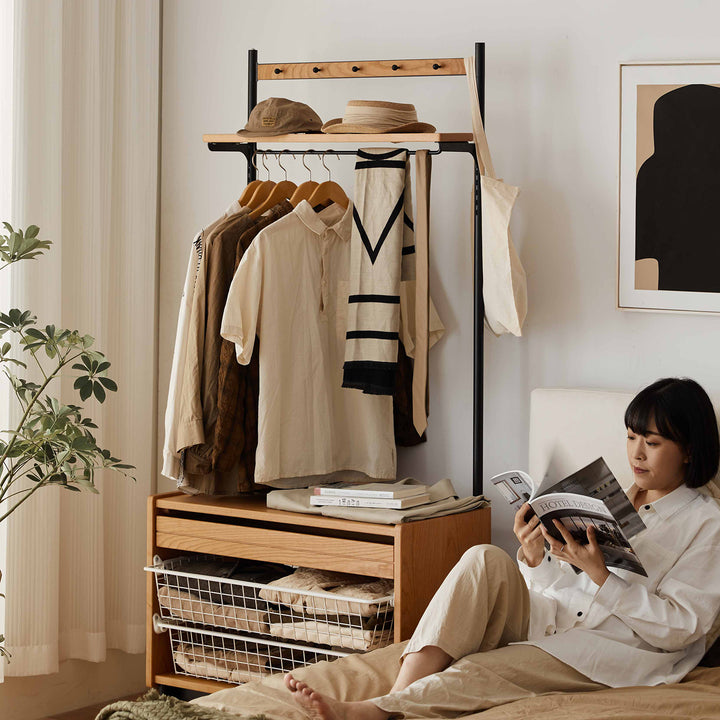 Scandinavian cherry wood clothes hanger cove in real life style.