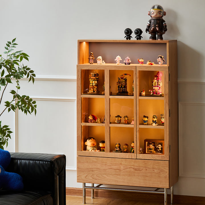 Scandinavian cherry wood display cabinet time in still life.