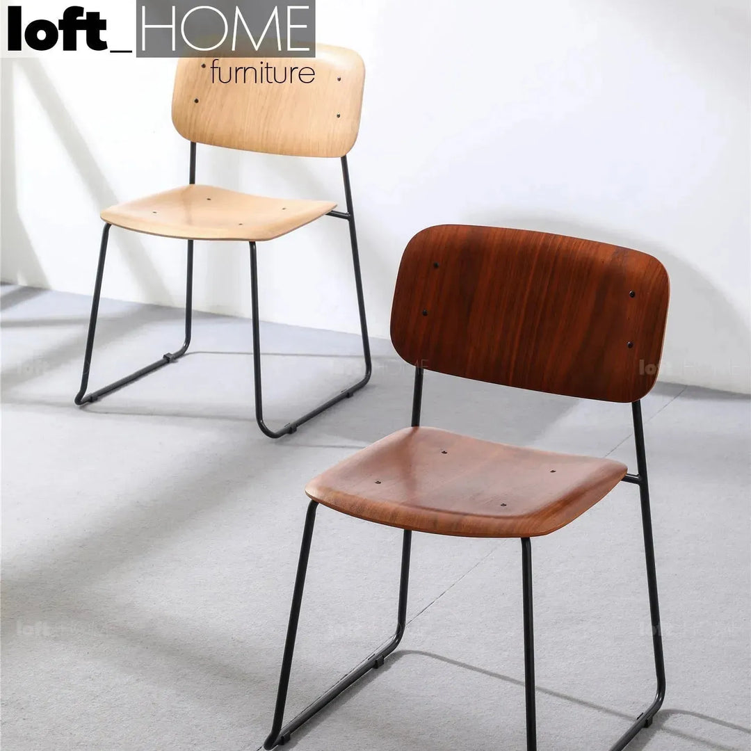 Industrial wood dining chair tambo in panoramic view.