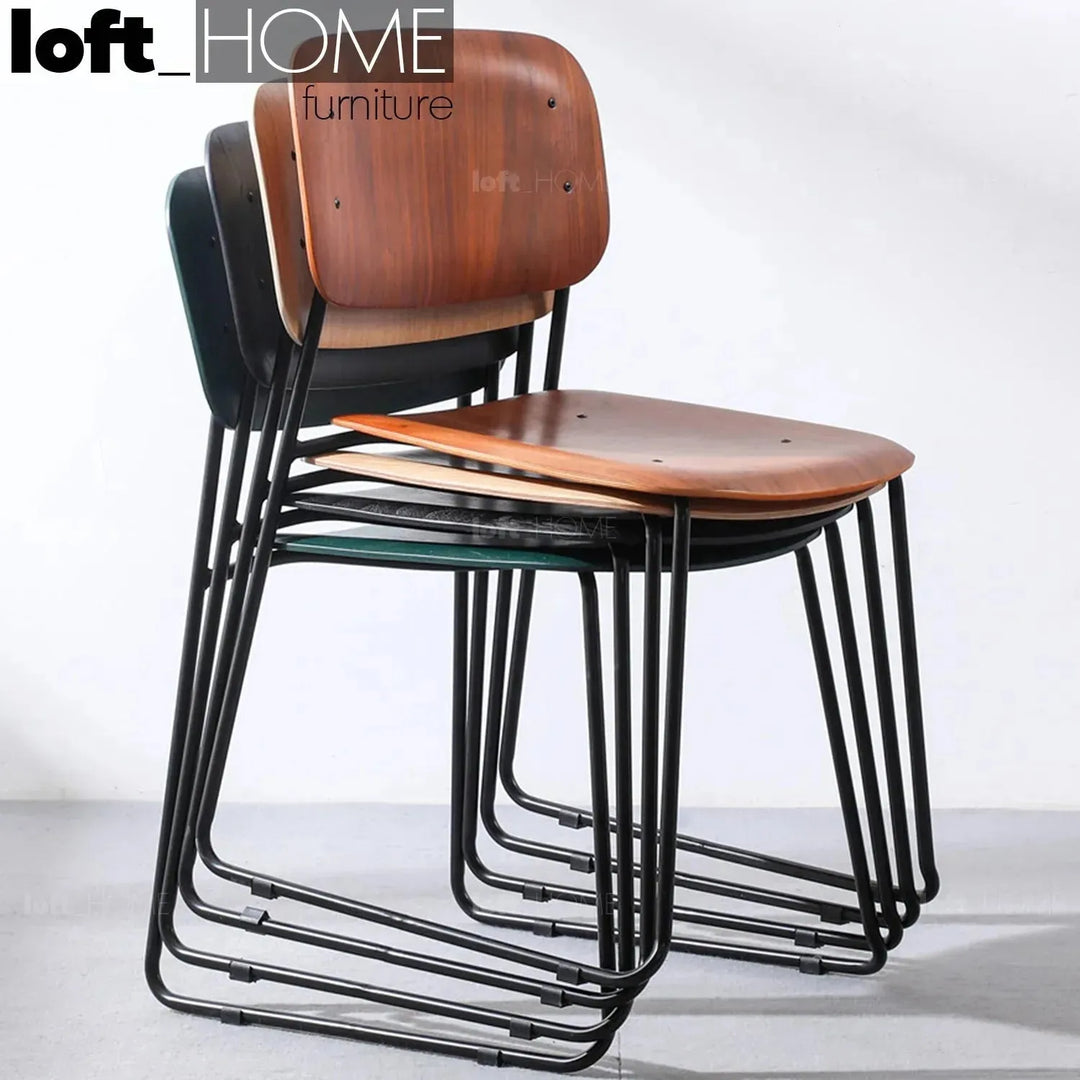 Industrial wood dining chair tambo in close up details.