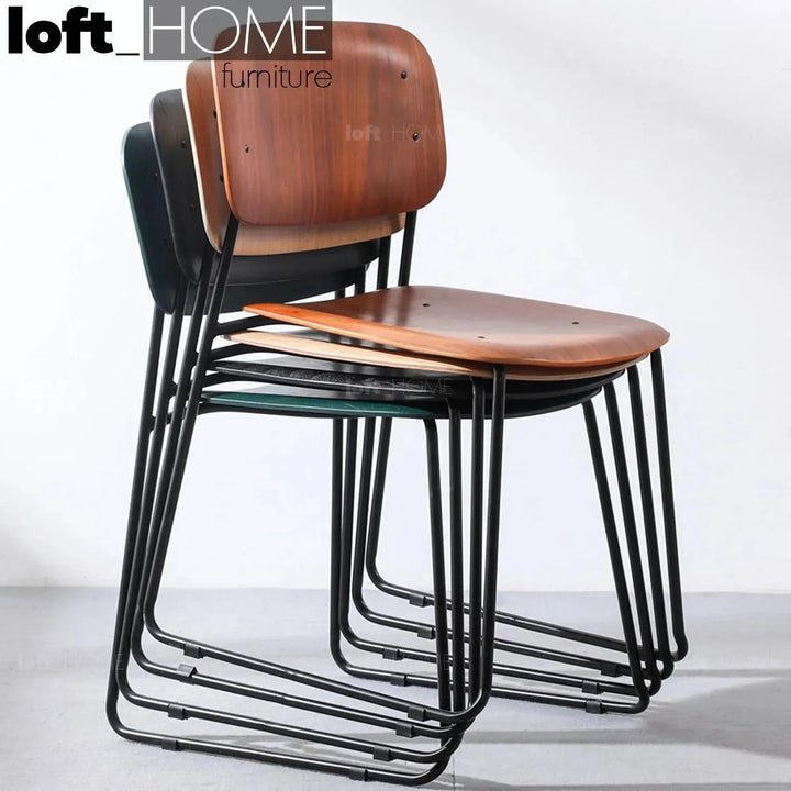 Industrial wood dining chair tambo in close up details.