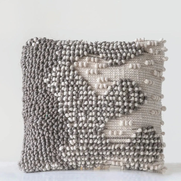 Versatile hand-woven wool looped pillow color swatches.