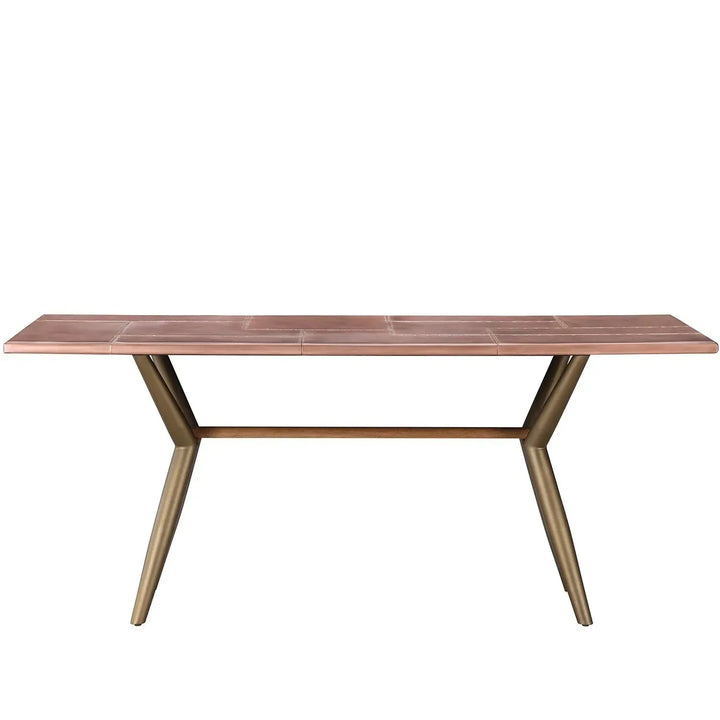 Industrial copper dining table lucien rose in white background.