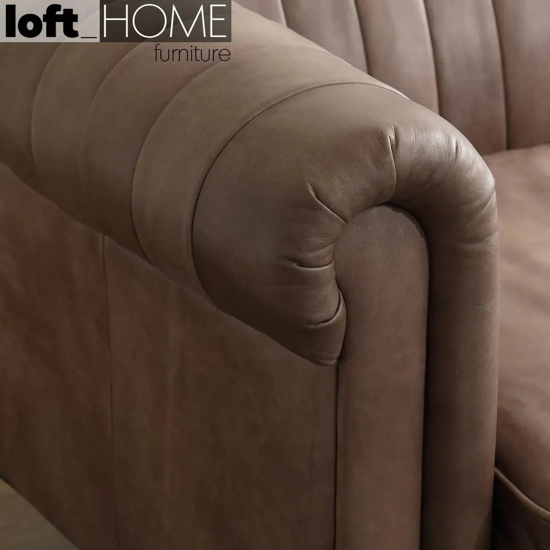 Vintage genuine leather 1 seater sofa elis with context.