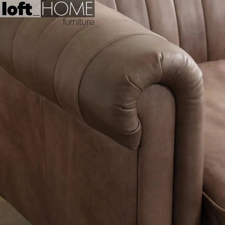 Vintage genuine leather 1 seater sofa elis with context.