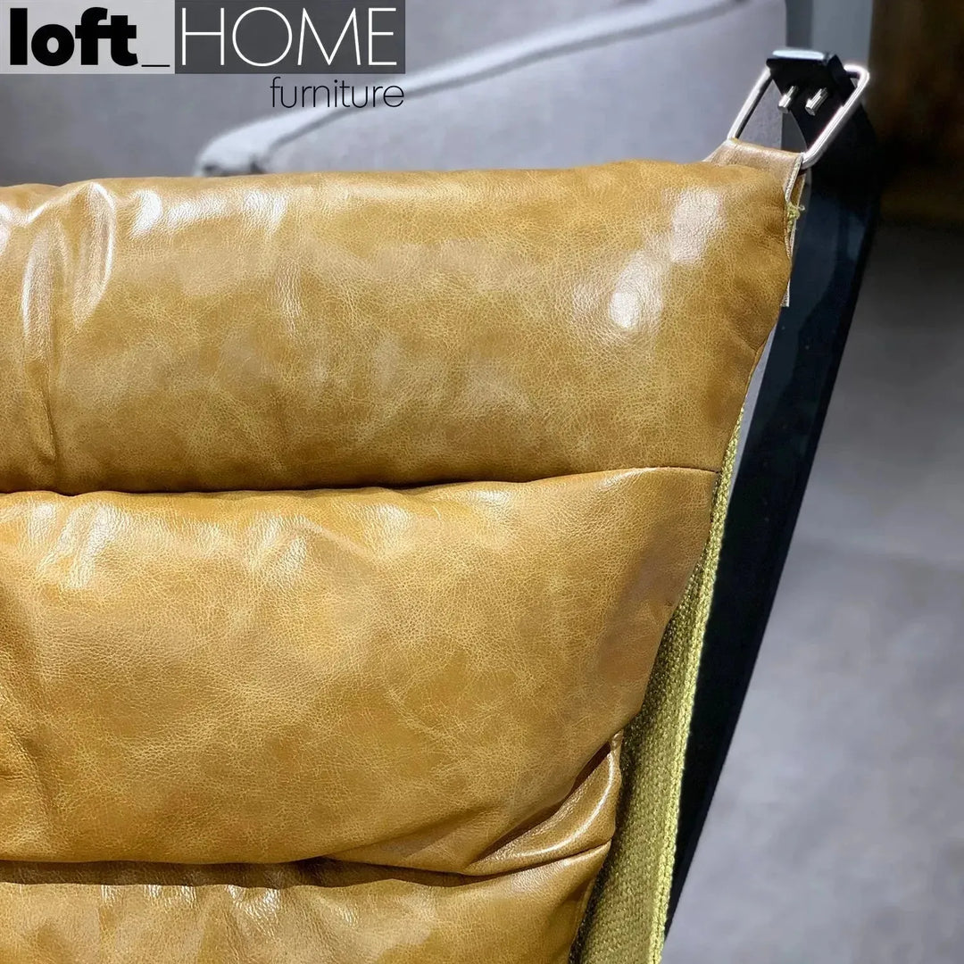 Industrial genuine leather 1 seater sofa hopper in panoramic view.