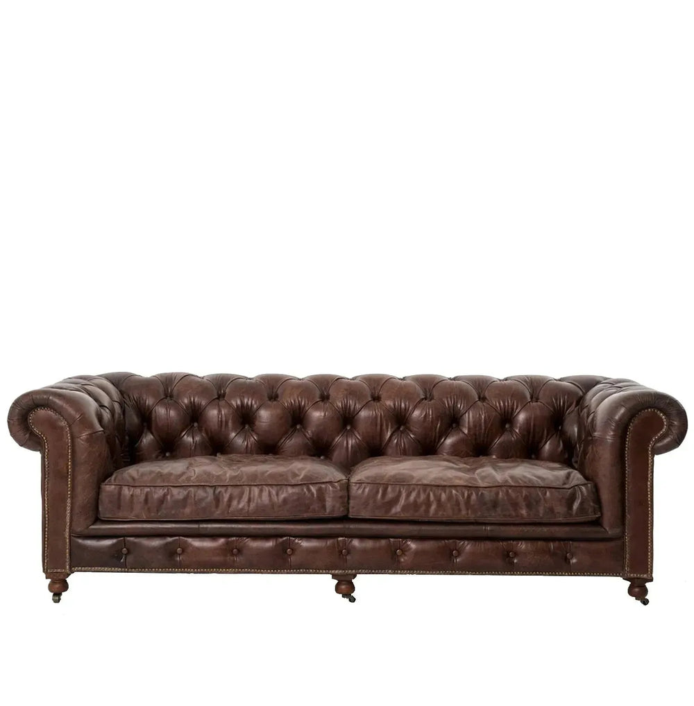 Vintage genuine leather 3 seater sofa chesterfield classic in white background.